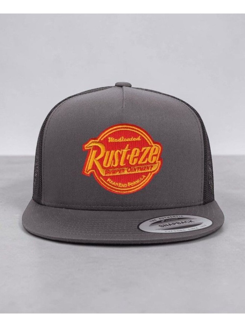 Rust-eze Patch on YP Flat Bill Trucker Hat Mesh Back Snapback charcoal/blk